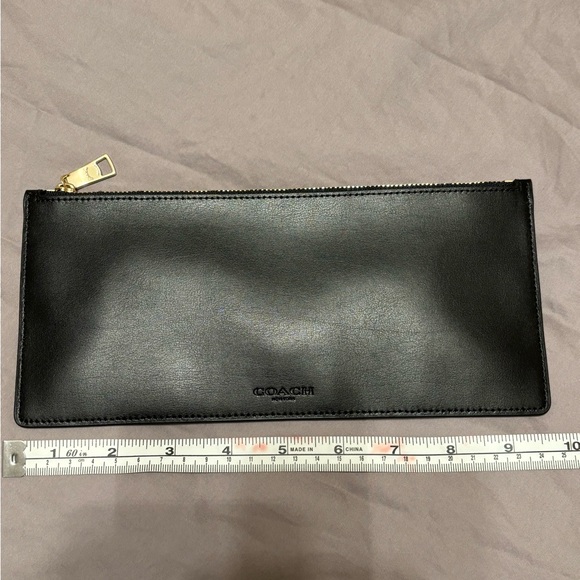 Coach Handbags - Coach Leather Pouch black with Gold Accents